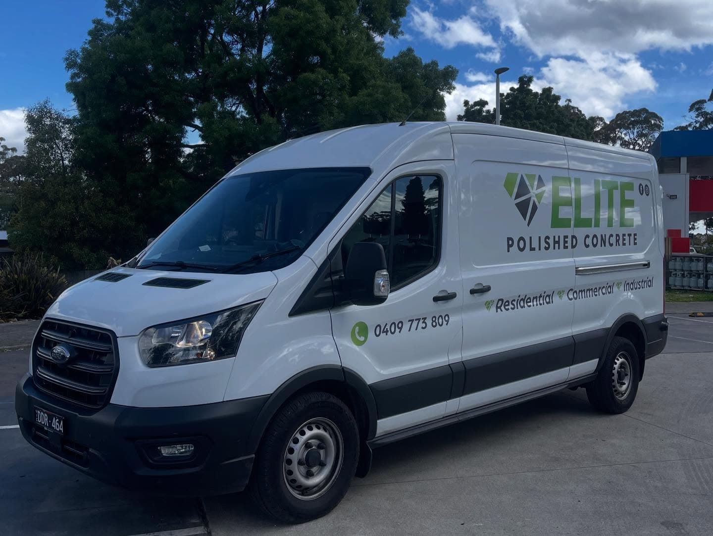 Elite Polished Concrete team working on a polished concrete floor
